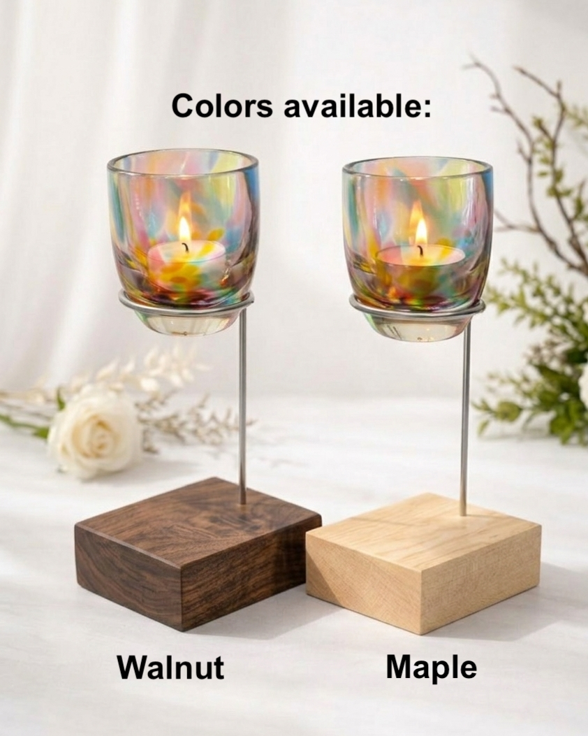 Two candle holders with wooden bases, one in walnut and one in maple, on a white background.