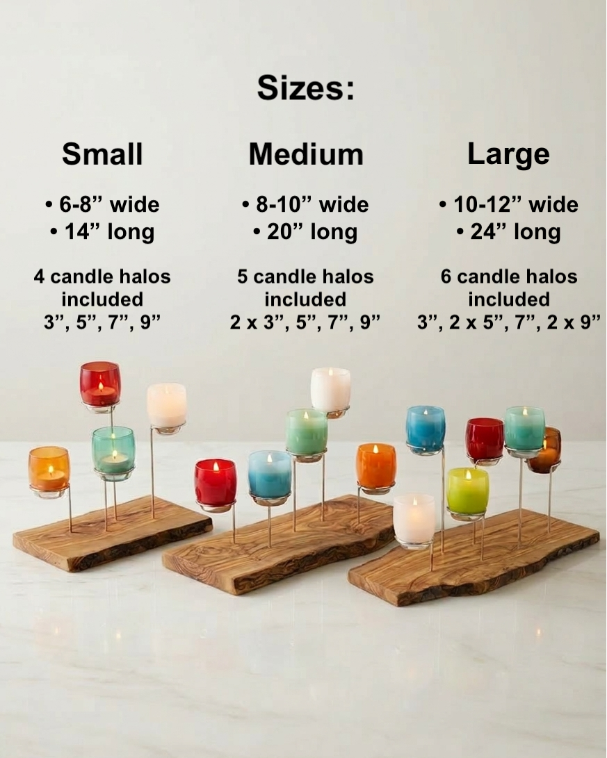 Three candle holders of different sizes with colorful glassybaby candles on a white background.